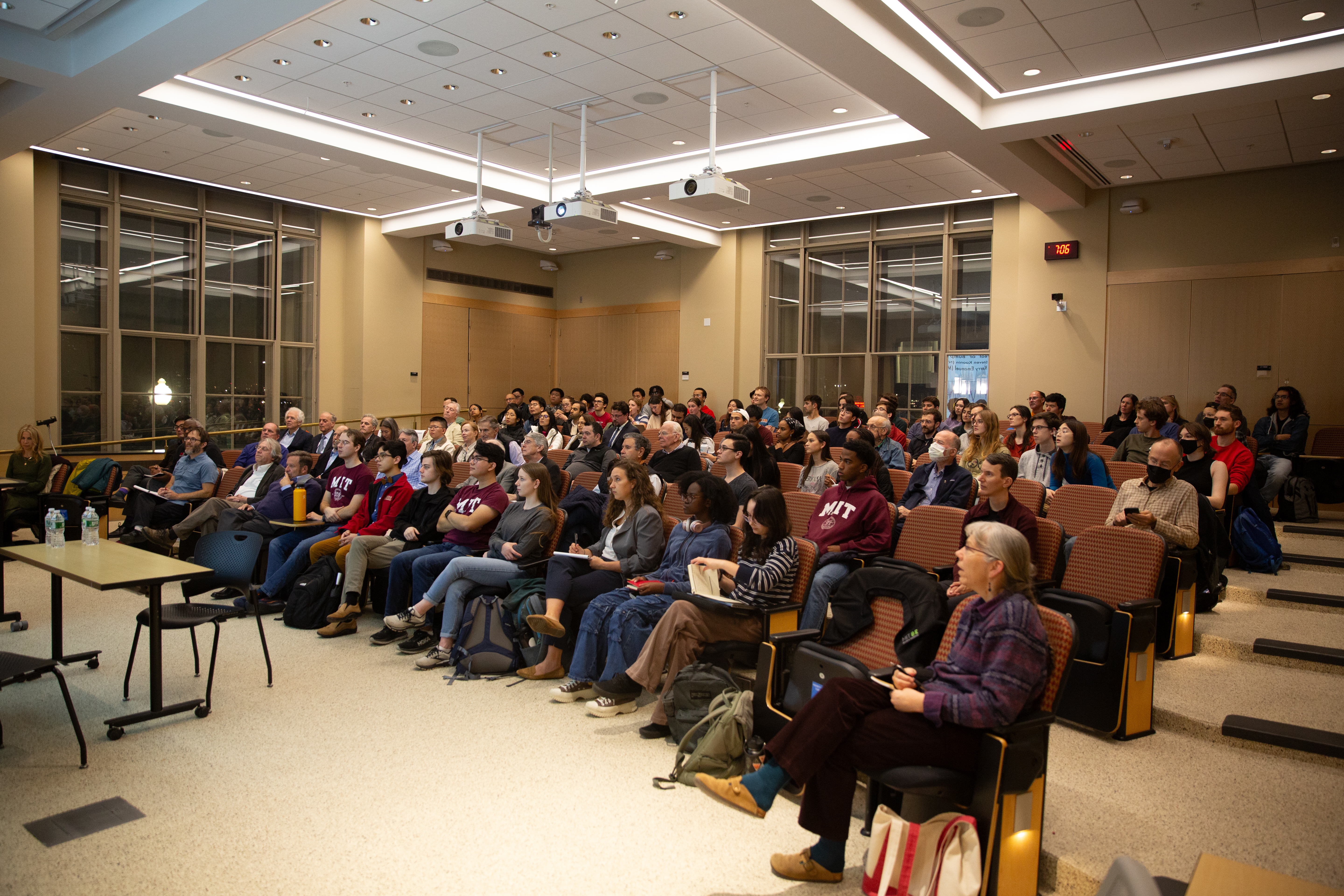 The audience during a "civil discourse" discussion of climate change in a room at MIT