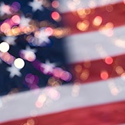 U.S. Flag with firework reflections