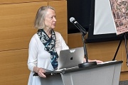 Deborah Fitzgerald addresses attendees during the Symposium on the History of Technology at MIT's Tang Auditorium.