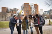 Students in the 2023 DEDP master’s cohort gather on MIT’s campus.