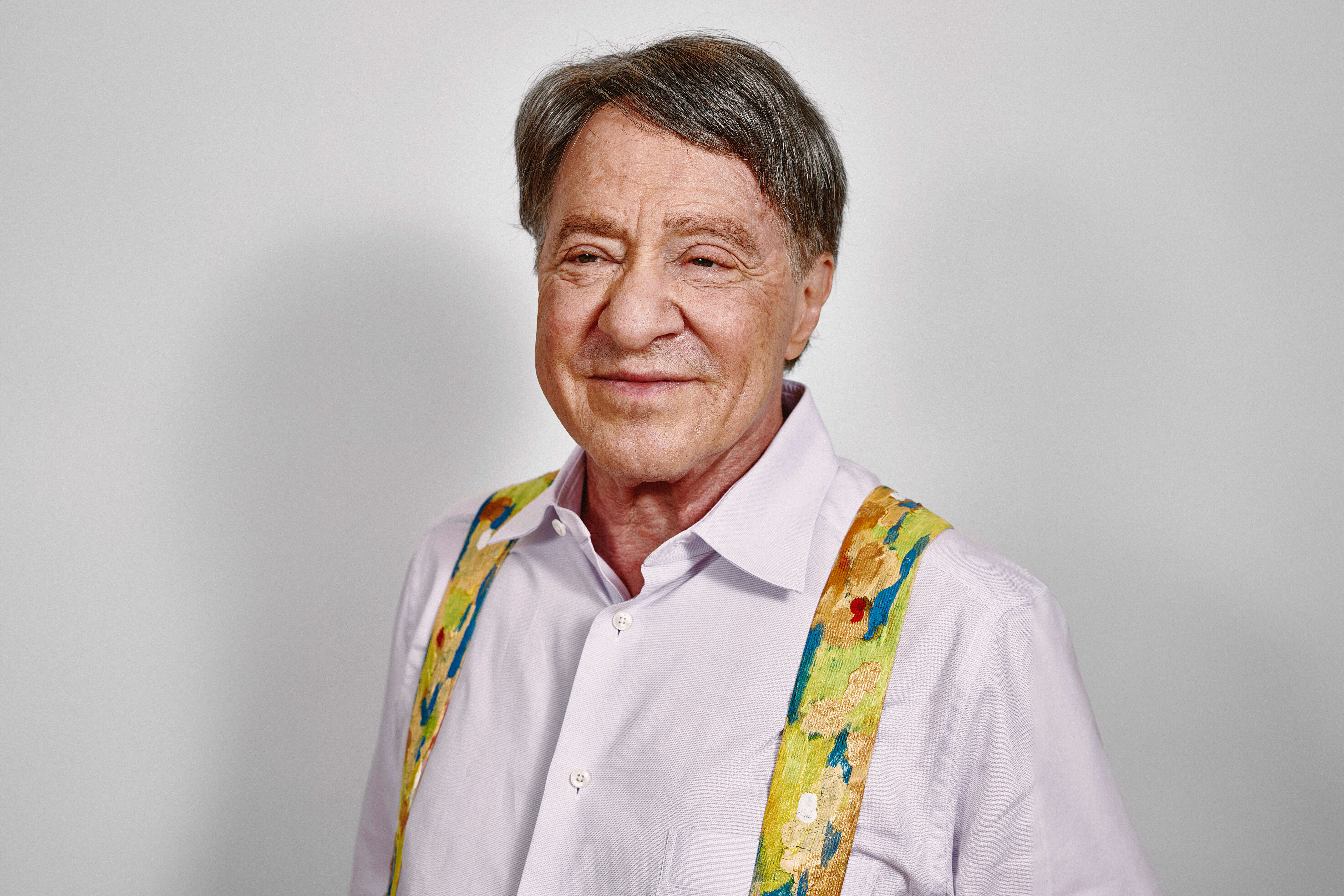 Ray Kurzweil wears a collared shirt and suspenders