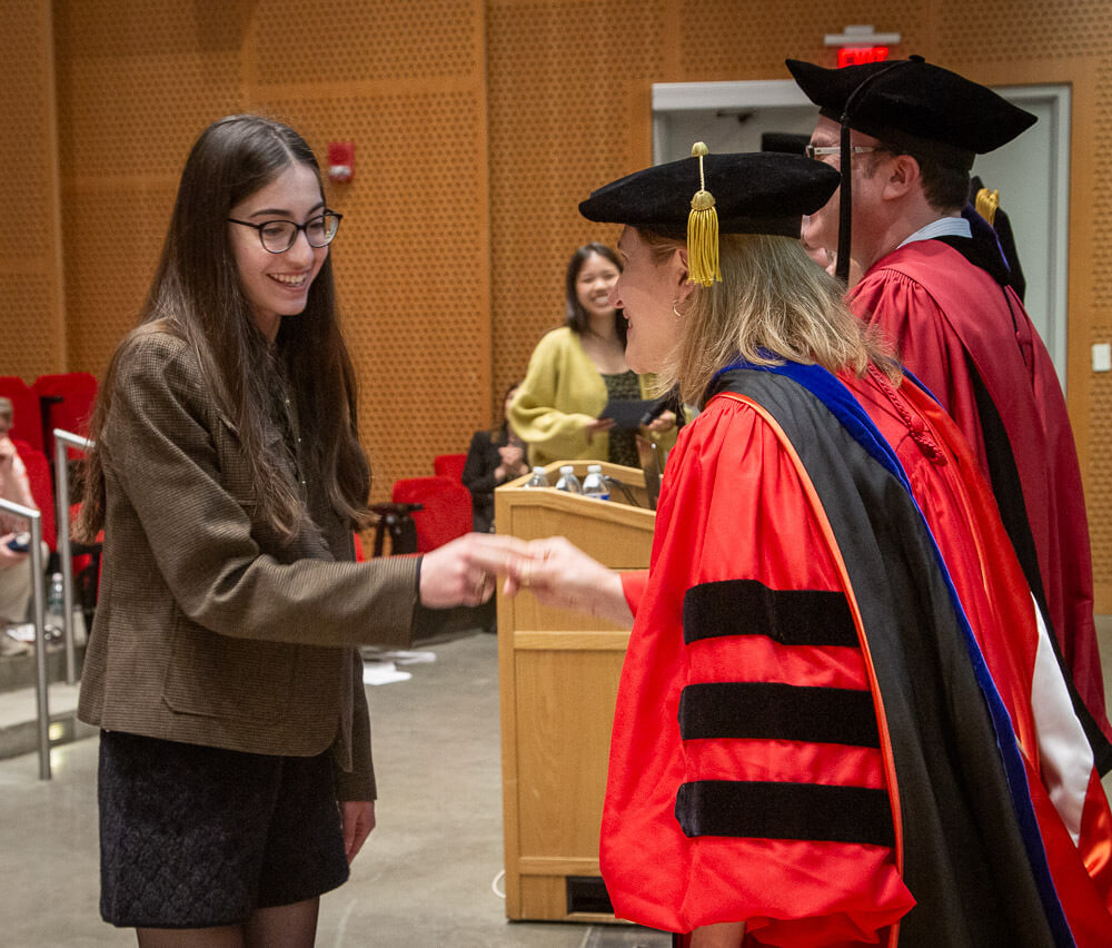 A Phi Beta Kappa inductee is welcomed into Xi of Massachusetts.