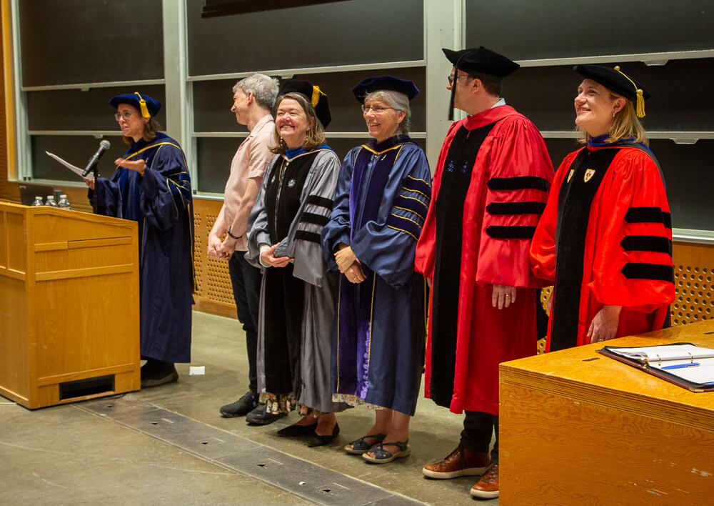 Xi of Massachusetts leaders welcome attendees to the Phi Beta Kappa induction ceremony.