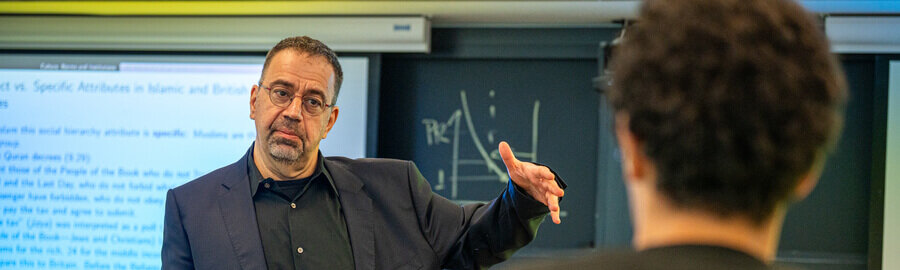 Daron Acemoglu teaches economics class 14.773 (Political Economy: Institutions and Development) at MIT.